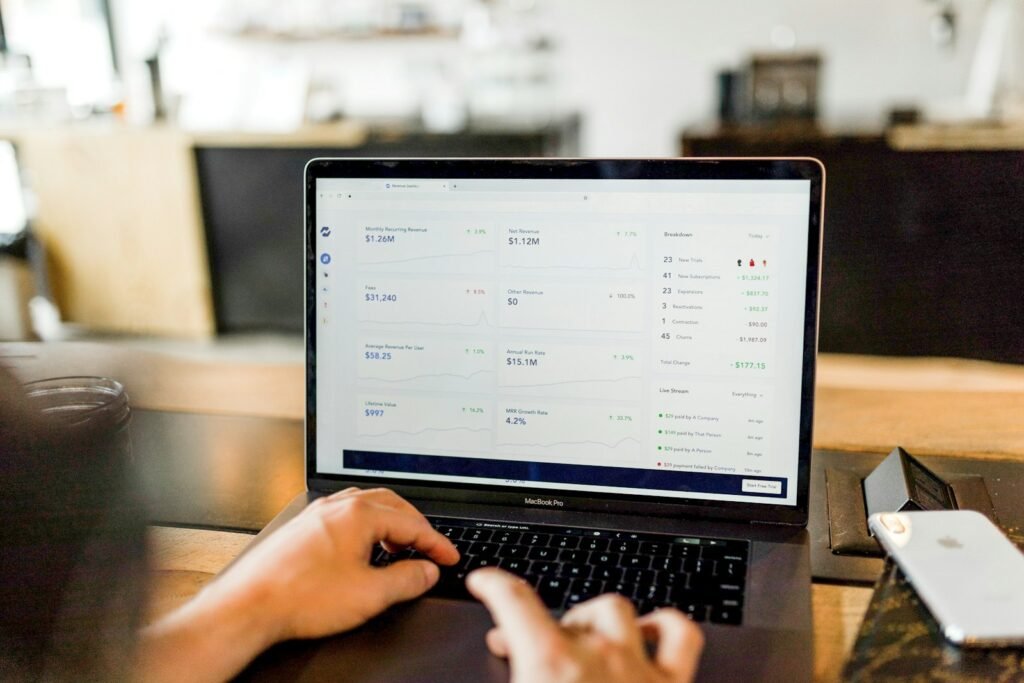 Using accounting software on a laptop