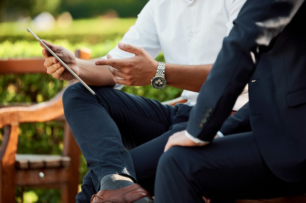 Business advisors reviewing data on a tablet