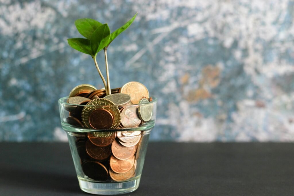 Coins in a jar showing business growth