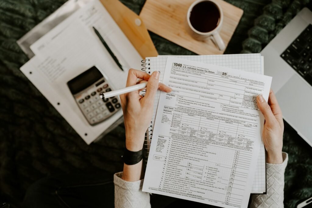 Reviewing tax forms with a calculator