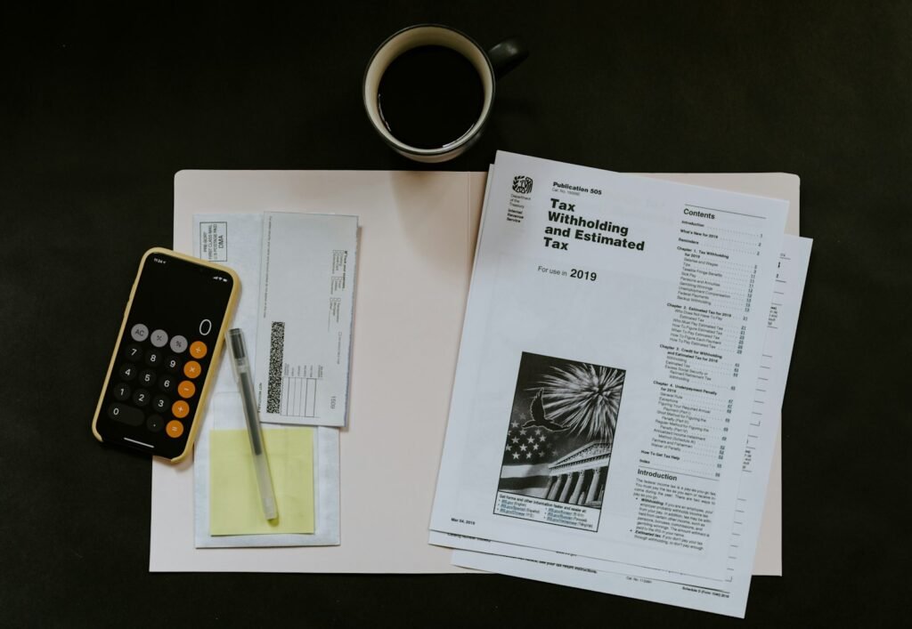 Tax return documents and calculator